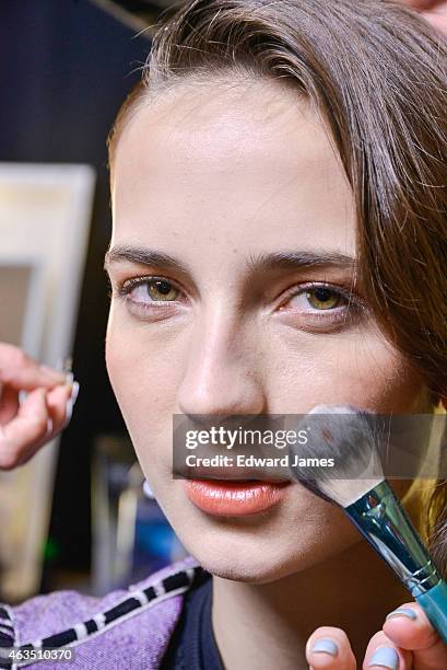 Model poses backstage at the Herve Leger by Max Azria fashion show at The Theatre at Lincoln Center on February 14, 2015 in New York City.