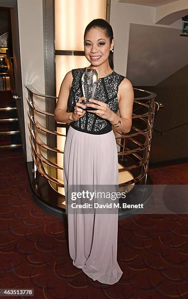 Eva Noblezada, winner of Best Actress in a Musical for "Miss Saigon", poses in the press room at the WhatsOnStage Awards at The Prince of Wales...