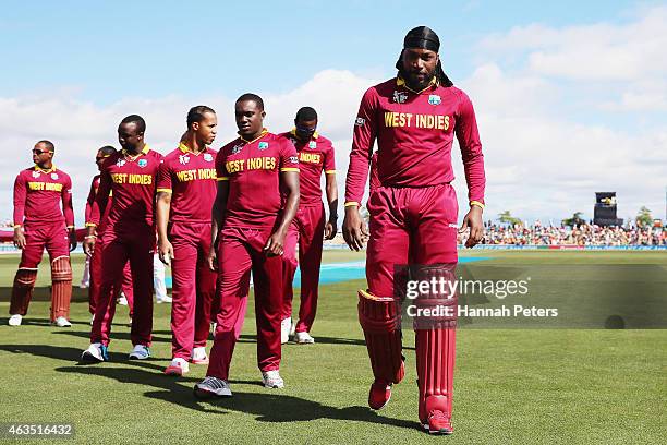 Chris Gayle of West Indies walks off to prepare to bat during the 2015 ICC Cricket World Cup match between the West Indies and Ireland at Saxton...