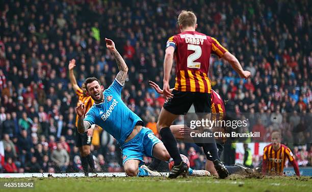 Steven Fletcher of Sunderland is brought down in the penalty box by Rory McArdle of Bradford City during the FA Cup Fifth round match between...