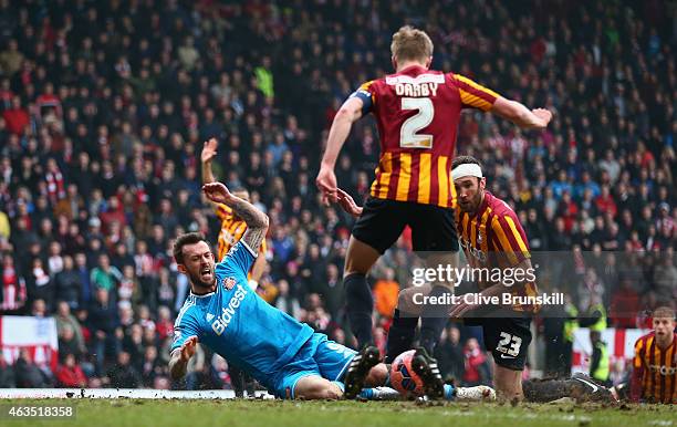 Steven Fletcher of Sunderland is brought down in the penalty box by Rory McArdle of Bradford City during the FA Cup Fifth round match between...