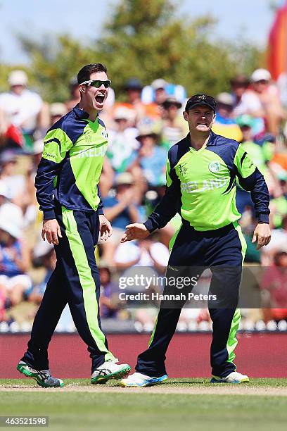 George Dockrell of Ireland celebrates the wicket of Denesh Ramdin of West Indies during the 2015 ICC Cricket World Cup match between the West Indies...