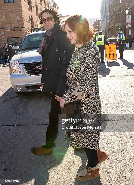 Aaron Hendricks and Christina Hendricks arrive at Day 2 of Oakley Learn To Ride With AOL At Sundance on January 18, 2014 in Park City, Utah.