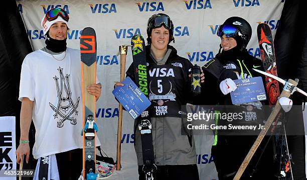 Bobby Brown of the USA, third place, Joss Christensen of the USA, first place and Gus Kenworthy of the USA, second place, receive their trophies...
