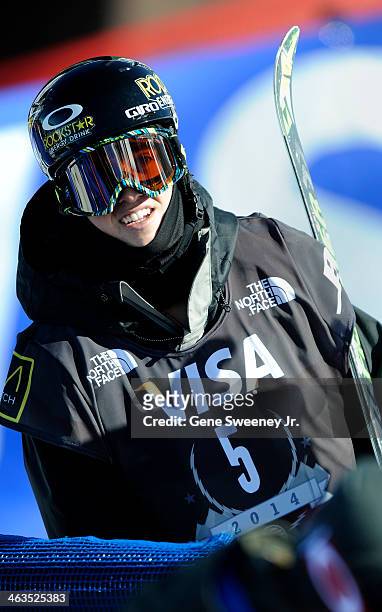 First place finisher Joss Christensen of the United States watches replays of his run at the Men's Slopeside competition on day two of the Visa U.S....