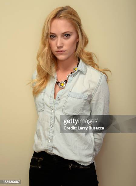 Actress Maika Monroe poses for a portrait during the 2014 Sundance Film Festival at the Getty Images Portrait Studio at the Village At The Lift...