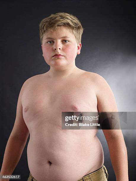 overweight shirtless boy - chubby boy fotografías e imágenes de stock