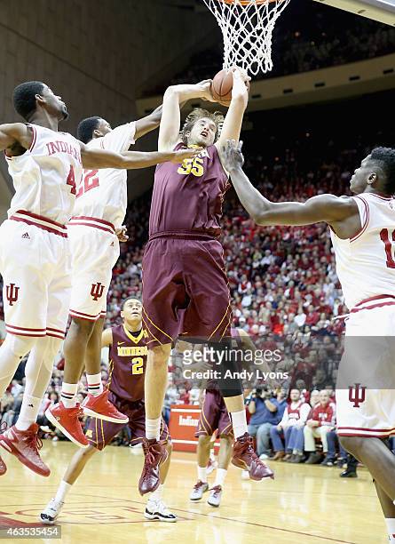 Elliott Eliason of the Minnesota Golden Golphers grabs a rebound during the game against the Indiana Hoosiers at Assembly Hall on February 15, 2015...