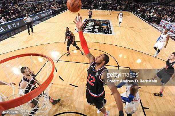 LaMarcus Aldridge of the Western Conference All-Stars goes up for a rebound against the Eastern Conference All-Star in the 2015 NBA All-Star Game on...