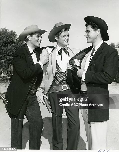 The Forbidden City" - Airdate: March 26, 1961. L-R: JACK KELLY;ROGER MOORE;ROBERT COLBERT