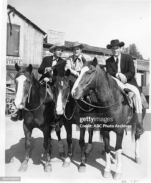 The Forbidden City" - Airdate: March 26, 1961. L-R: JACK KELLY;ROGER MOORE;ROBERT COLBERT