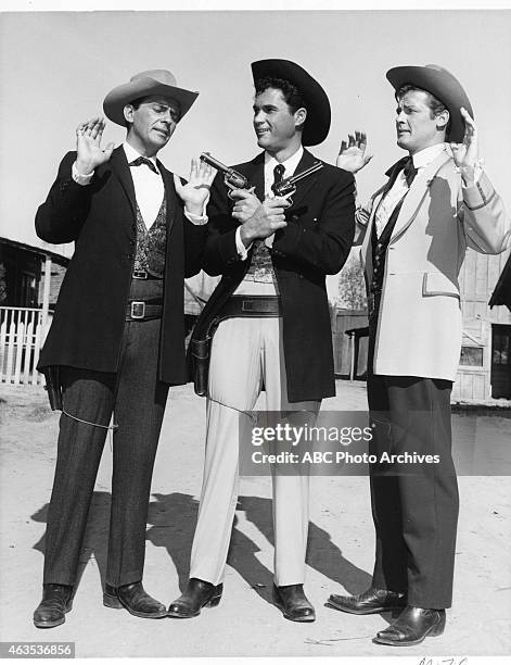 The Forbidden City" - Airdate: March 26, 1961. L-R: JACK KELLY;ROBERT COLBERT;ROGER MOORE