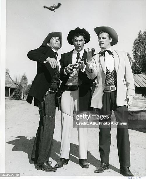 The Forbidden City" - Airdate: March 26, 1961. L-R: JACK KELLY;ROBERT COLBERT;ROGER MOORE