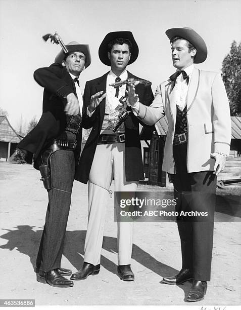 The Forbidden City" - Airdate: March 26, 1961. L-R: JACK KELLY;ROBERT COLBERT;ROGER MOORE