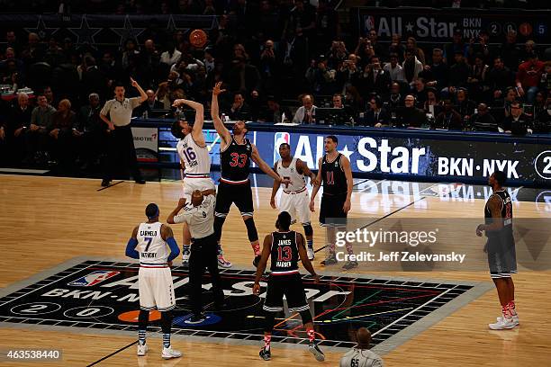 Pau Gasol of the Chicago Bulls and the Eastern Conference tips off against Marc Gasol of the Memphis Grizzlies and the Western Conference during the...