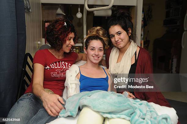 Back home after a month in the hospital, Amanda Craig center, meets with Destiny Perez right, for the first time after Perez came to Craig's rescue...