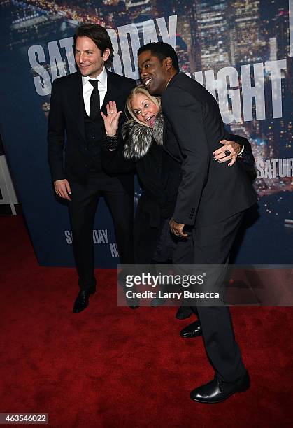 Bradley Cooper, Gloria Campano and Chris Rock attend SNL 40th Anniversary Celebration at Rockefeller Plaza on February 15, 2015 in New York City.