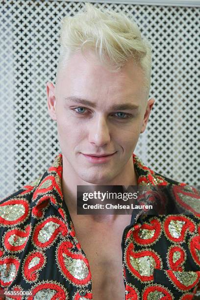 Model poses backstage before the Franco Lacosta presentation on February 15, 2015 in New York City.