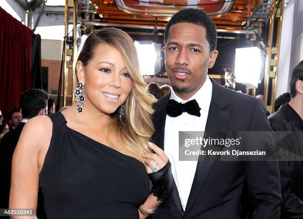 Singer-actress Mariah Carey and TV personality Nick Cannon attend the 20th Annual Screen Actors Guild Awards at The Shrine Auditorium on January 18,...