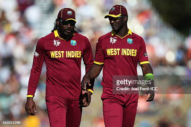 Chris Gayle and Darren Sammy of the West Indies during the 2015 ICC Cricket World Cup match between the West Indies and Ireland at Saxton Field on...