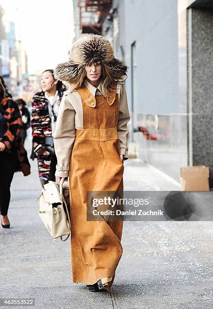 Guests are seen outside the DVF show on February 15, 2015 in New York City.