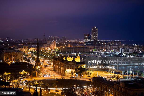 The marina area stands illuminated at night in the host city for the Mobile World Congress in Barcelona, Spain, on Friday, Feb. 22, 2013. The Mobile...