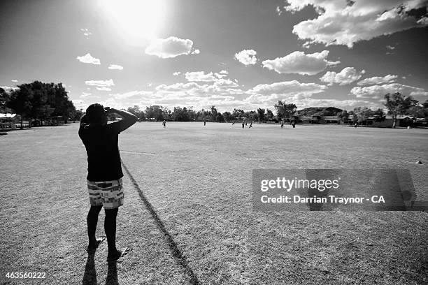 The Miwatj Dolphins from Arnhem Land in the Northern Territory play cricket during the 20415 Imparja Cup on February 13, 2015 in Alice Springs,...