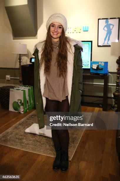 Kaitlyn Dever gets her hands on Wii Fit U while at the Nintendo Chalet during the 2014 Sundance Film Festival on January 18, 2014 in Park City, Utah.