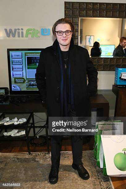 Michael Pitt gets his hands on Wii Fit U while at the Nintendo Chalet during the 2014 Sundance Film Festival on January 18, 2014 in Park City, Utah.