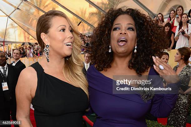 Actress/singer Mariah Carey and Oprah Winfrey attend 20th Annual Screen Actors Guild Awards at The Shrine Auditorium on January 18, 2014 in Los...
