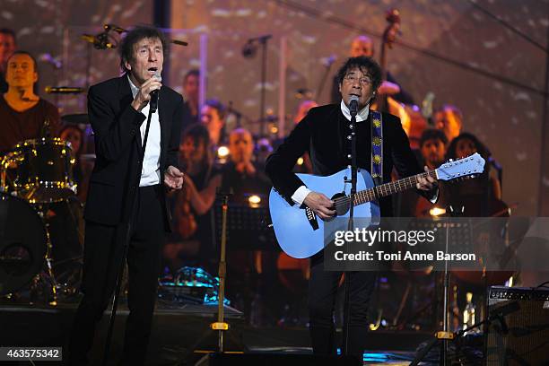 Alain Souchon and Laurent Voulzy perform during Les Victoires De La Musique at Le Zenith on February 13, 2015 in Paris, France.