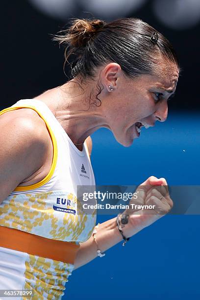 Flavia Pennetta of Italy celebrates winining a point in her fourth round match against Angelique Kerber of Germany during day seven of the 2014...