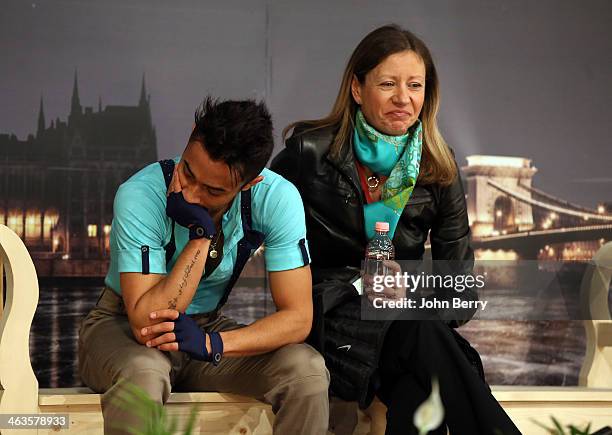 Florent Amodio of France with his coach Katia Krier competes in the Men Free Skating event of the ISU European Figure Skating Championships 2014 held...