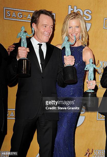 Actors Bryan Cranston and Anna Gunn pose in the press room during the 20th Annual Screen Actors Guild Awards at The Shrine Auditorium on January 18,...