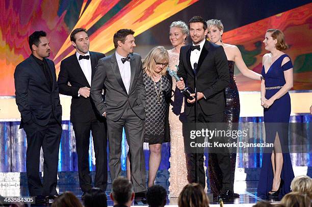 Actors Michael Pena, Alessandro Nivola, Jeremy Renner, Colleen Camp, Elisabeth Rohm, Bradley Cooper, Jennifer Lawrence, and Amy Adams accept the...