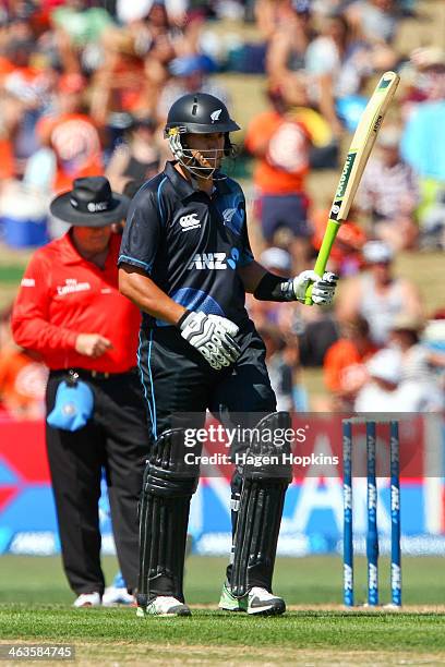 Ross Taylor of New Zealand celebrates his half century during the first One Day International match between New Zealand and India at McLean Park on...