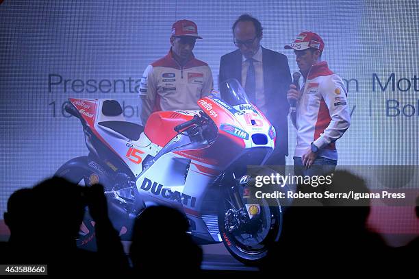 Italian riders Andrea Dovizioso and Andrea Iannone and journalist Guido Meda unveil the Ducati Desmosedici Moto GP 2015 Championship at Ducati...