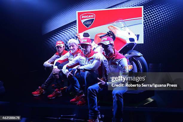 Italian riders Michele Pirro and Andrea Iannone and engineer Luigi Dall'Igna and rider Andrea Dovizioso unveil the Ducati Desmosedici Moto GP 2015...