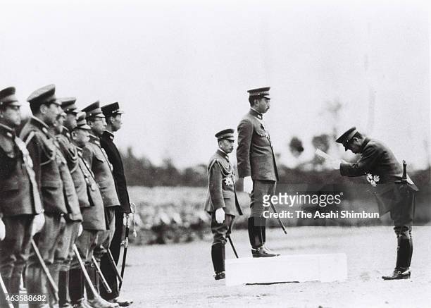 Army Minister Hideki Tojo received imperial speech by Emperor Hirohito during the military review to mark the 2,600 anniversary of the Japan's first...