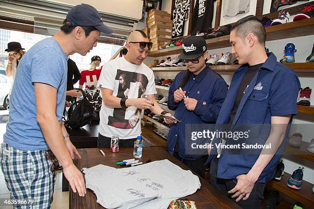 Prohgress, J-Splif and Kev Nish of Far East Movement attend a meet and greet at Canvas LA on January 18, 2014 in Los Angeles, California.