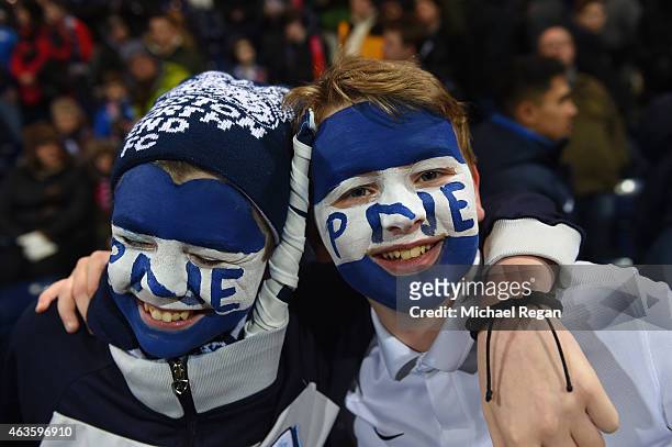 Preston North End fans soak up the atmosphere ahead of the FA Cup Fifth round match between Preston North End and Manchester United at Deepdale on...
