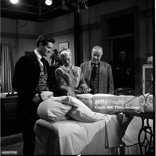 Remittance Man" - Airdate: November 4, 1958. HUGH O'BRIAN , JUDITH AMES AND HOWARD WENDELL WITH MICHAEL EMMET