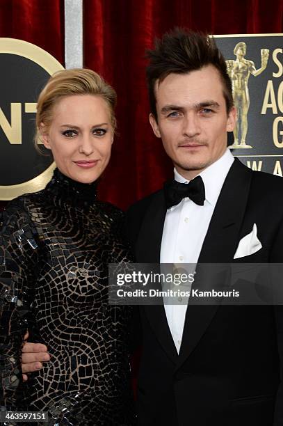 Actor Rupert Friend and Aimee Mullins attend 20th Annual Screen Actors Guild Awards at The Shrine Auditorium on January 18, 2014 in Los Angeles,...