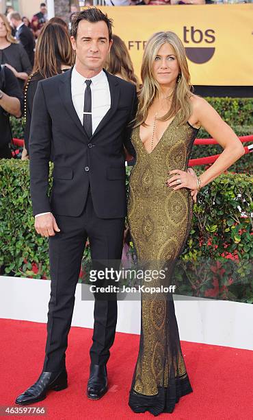 Actor Justin Theroux and actress Jennifer Aniston arrive at the 21st Annual Screen Actors Guild Awards at The Shrine Auditorium on January 25, 2015...