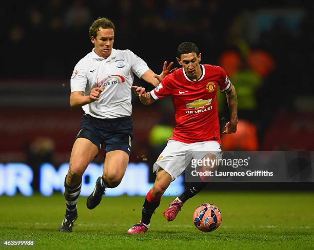 Kevin Davies of Preston North End and Angel di Maria of Manchester United compete for the ball during the FA Cup Fifth round match between Preston...