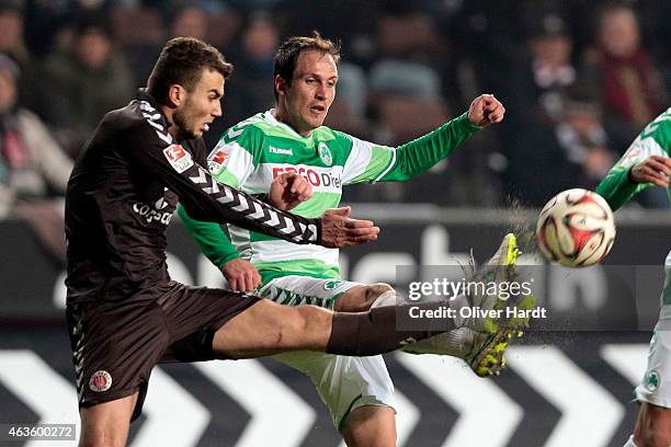 Dennis Daube of Hamburg and Sebastian Freis of Fuerth compete during the Second Bundesliga match between FC St. Pauli and Greuther Fuerth at...