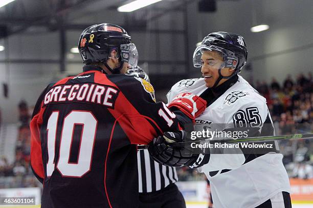 Daniel Walcott of the Blainville-Boisbriand Armada and Jeremy Gregoire of the Baie Comeau Drakkar shove each other during the QMJHL game at Centre...