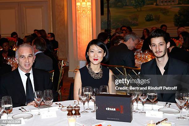 Cesar Academy President Alain Terzian and French minister of Culture, Communication Fleur Pellerin and actor Pierre Niney attend the 'Diner Des...