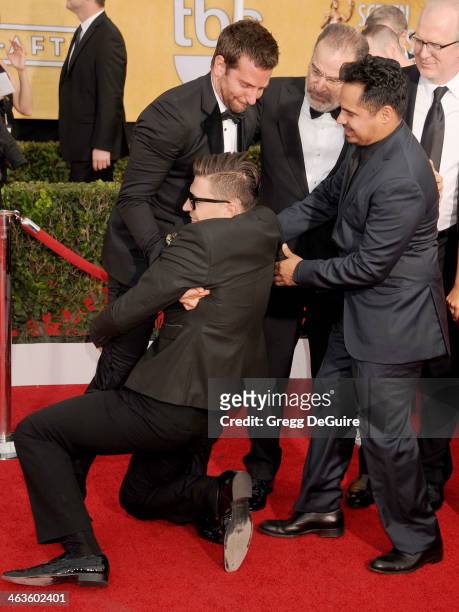 Actors Bradley Cooper, Michael Pena and Vitalii Sediuk at the 20th Annual Screen Actors Guild Awards at The Shrine Auditorium on January 18, 2014 in...