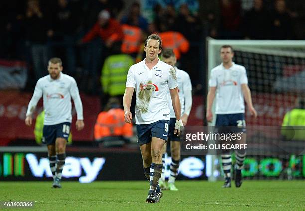 Preston's English striker Kevin Davies and Preston players react to conceding their second goal during the FA Cup fifth round football match between...